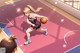 A girl dribbling a basketball on a basketball court.